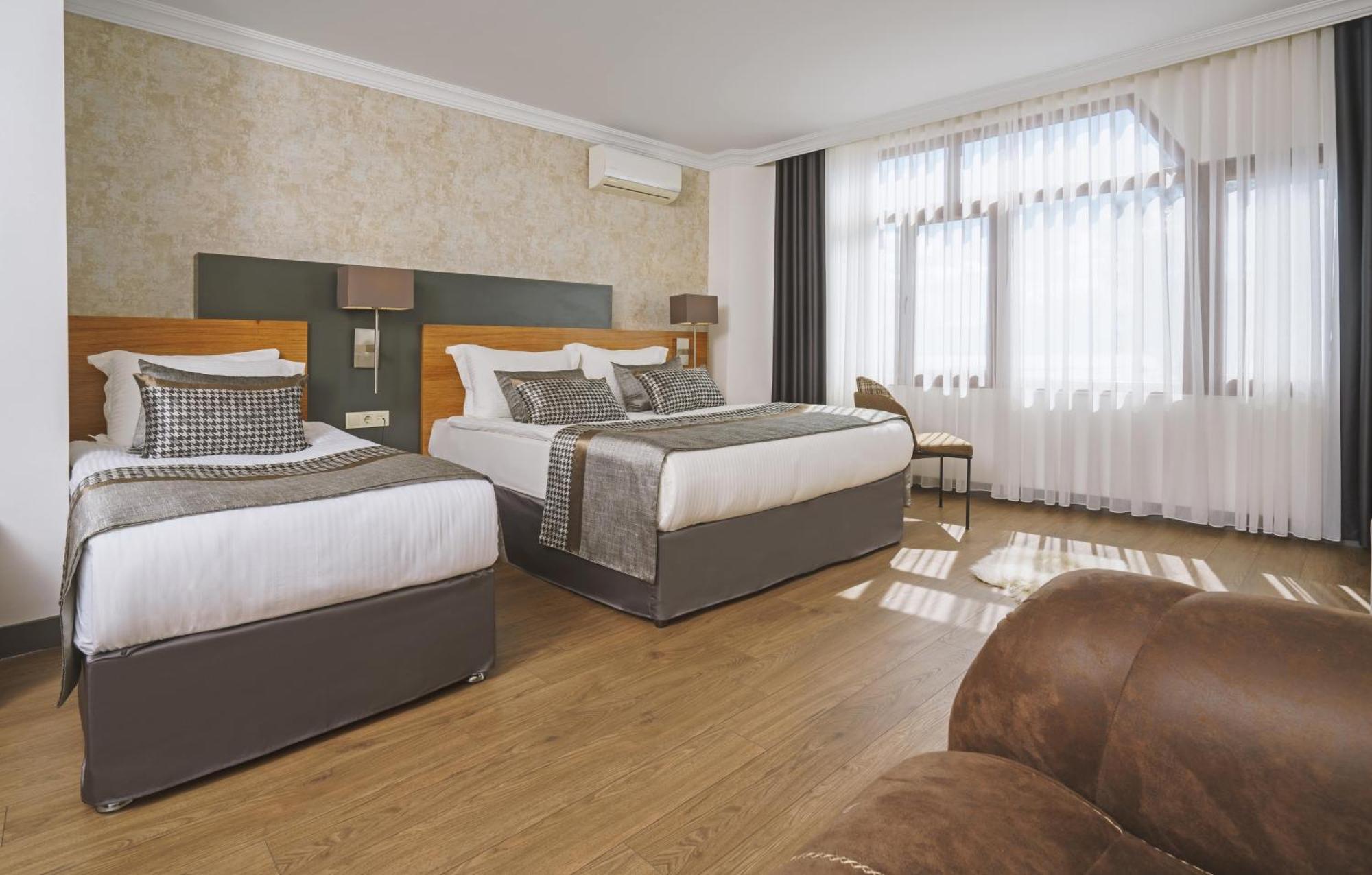 Qinn Hotel *